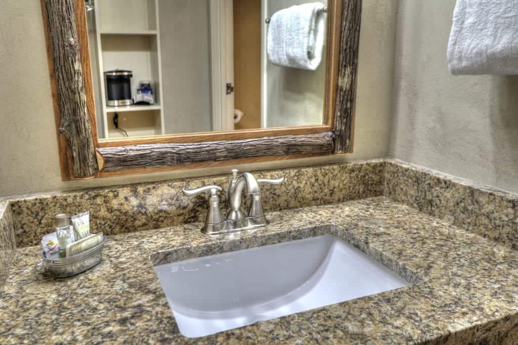 Bathroom vanity in queen room at hotel in Sevierville Tn