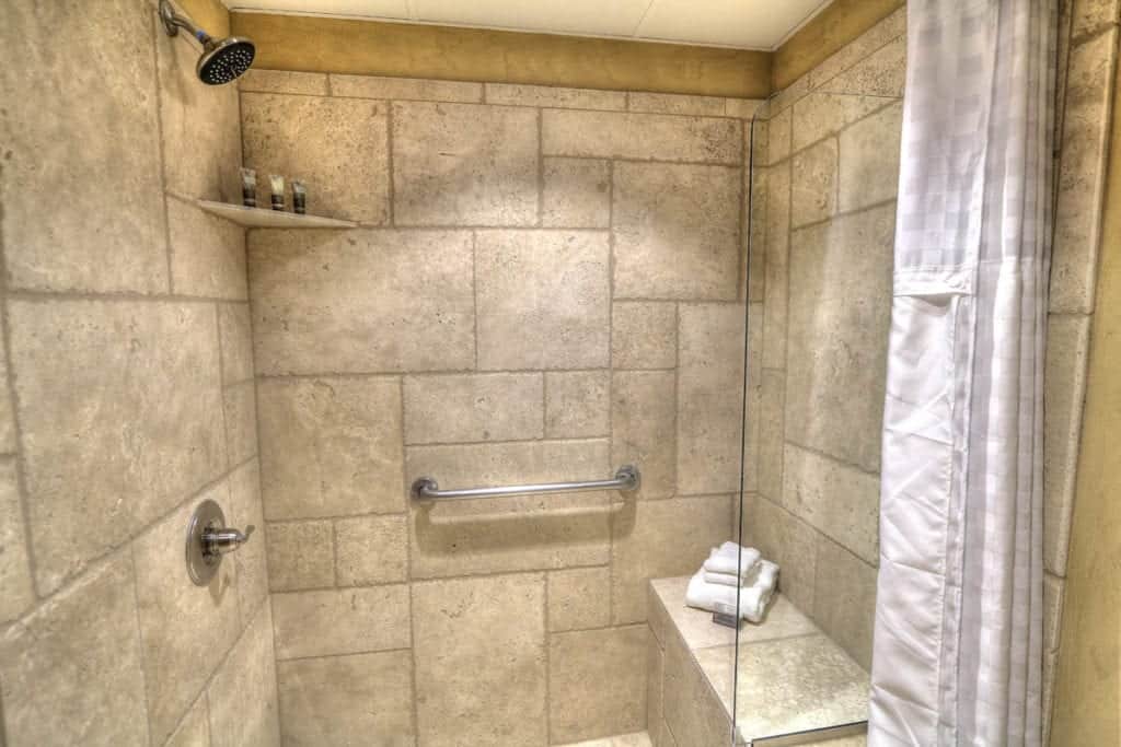 Luxurious tile shower in Sevierville hotel room
