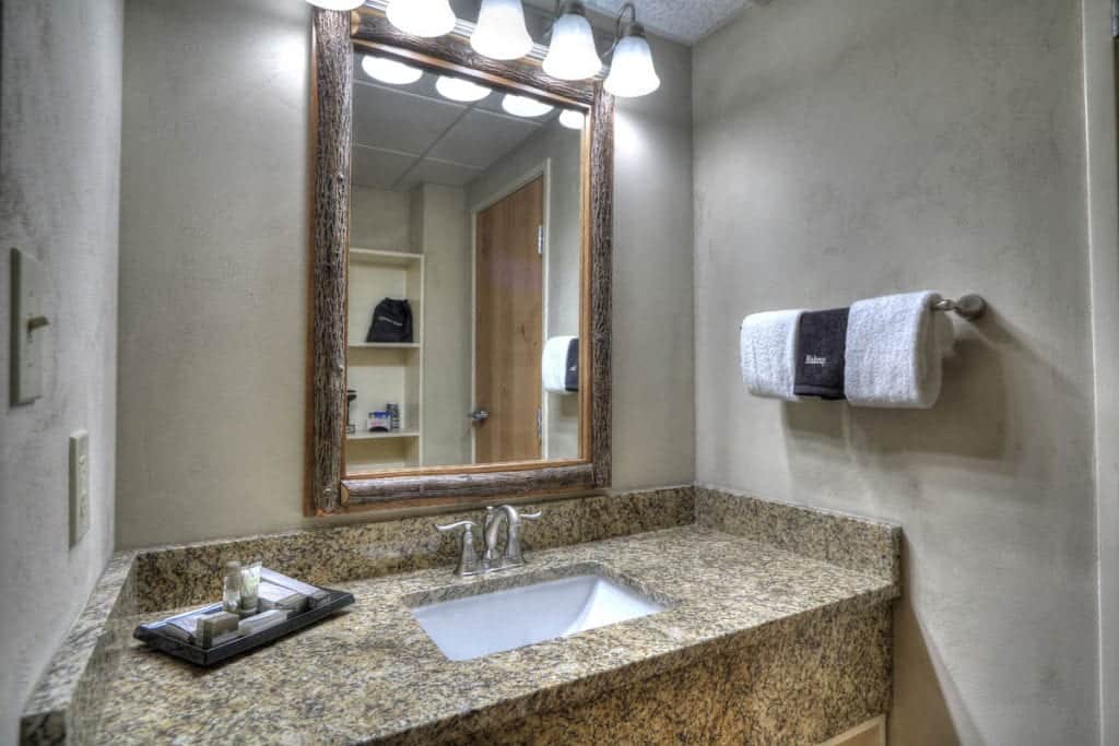 Granite vanity in premier king room with fireplace at Sevierville hotel
