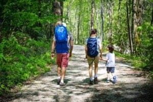 family hiking on the little river trail