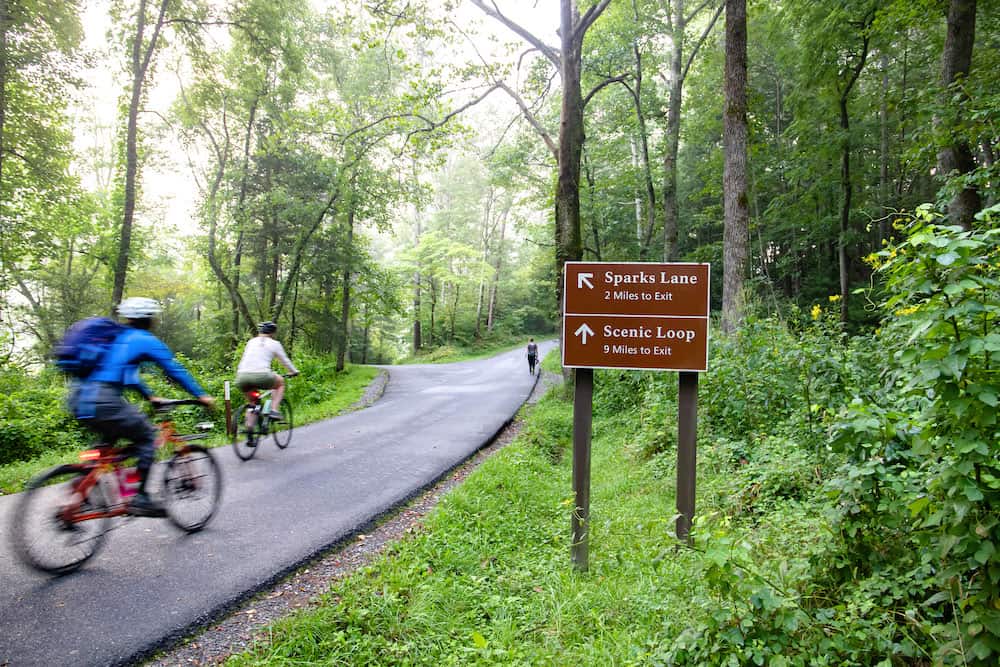 people riding bikes in Cades Cove